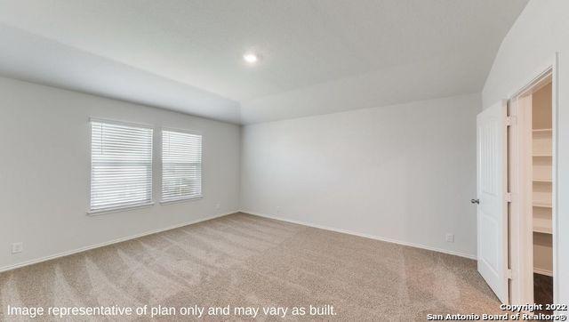 unfurnished room with carpet flooring and recessed lighting