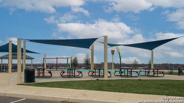 community play area featuring a yard