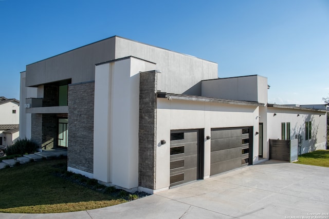 view of property exterior with a garage