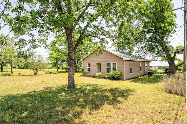 view of yard featuring central AC