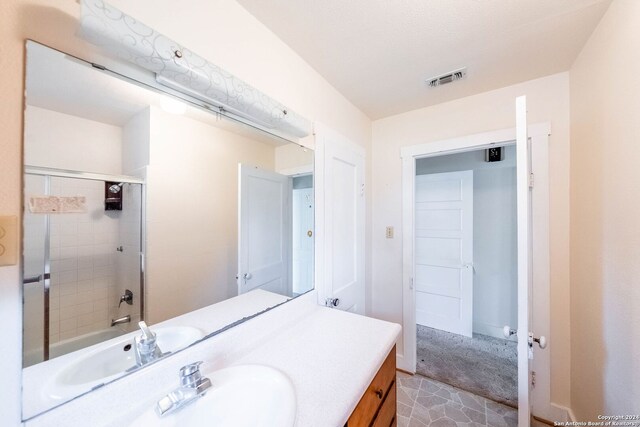 bathroom featuring large vanity