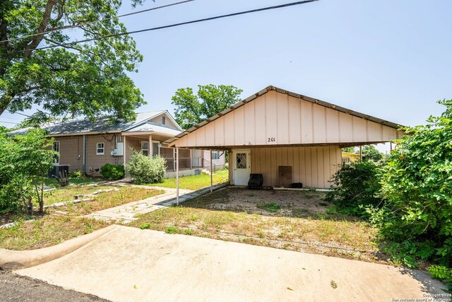 bungalow featuring a carport