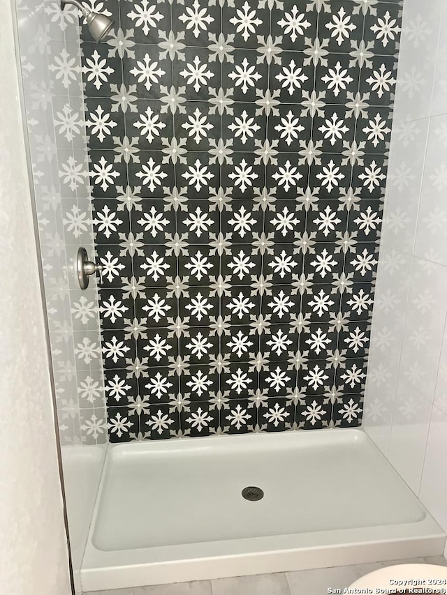 bathroom with a shower