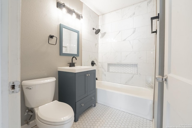 bathroom featuring shower / bath combination, a textured wall, vanity, and toilet