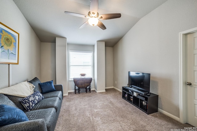 living room with ceiling fan, light colored carpet, and lofted ceiling