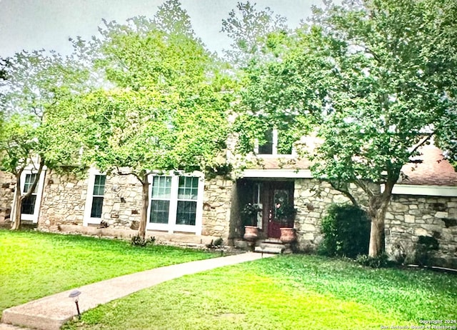 view of front of home with a front yard