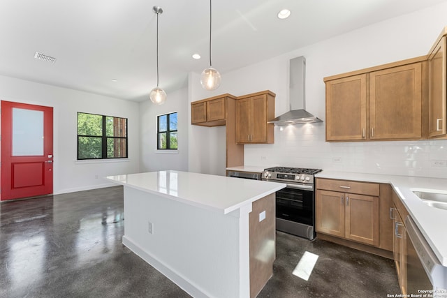 kitchen featuring tasteful backsplash, pendant lighting, a kitchen island, wall chimney range hood, and gas range