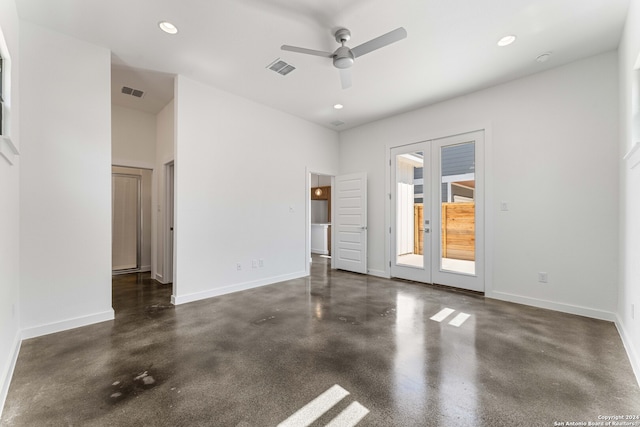 spare room featuring french doors and ceiling fan