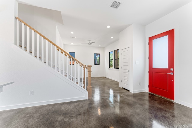 entrance foyer featuring ceiling fan