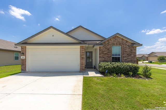 ranch-style home with a front yard and a garage