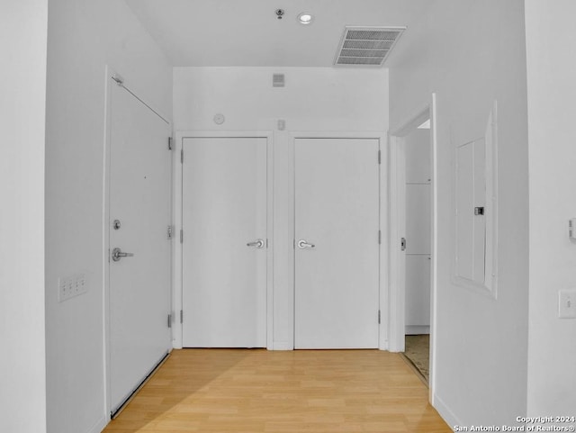 hall featuring light hardwood / wood-style flooring