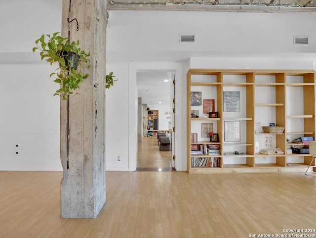 interior space with hardwood / wood-style floors