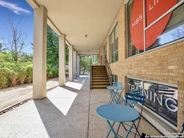 view of patio featuring covered porch