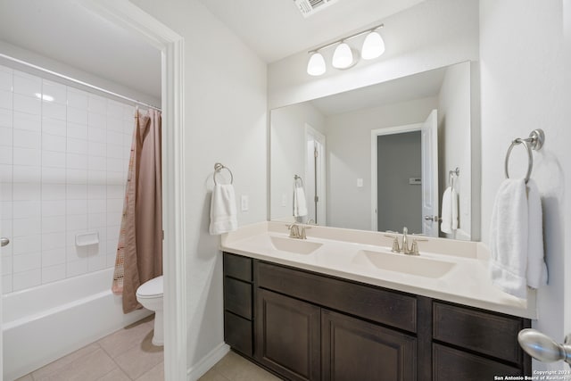 full bathroom featuring tile patterned flooring, vanity, shower / bath combination with curtain, and toilet