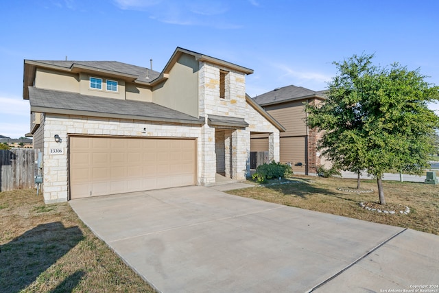 view of front of property featuring a garage