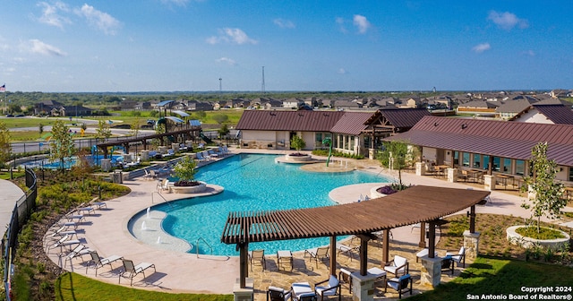 view of swimming pool featuring a patio