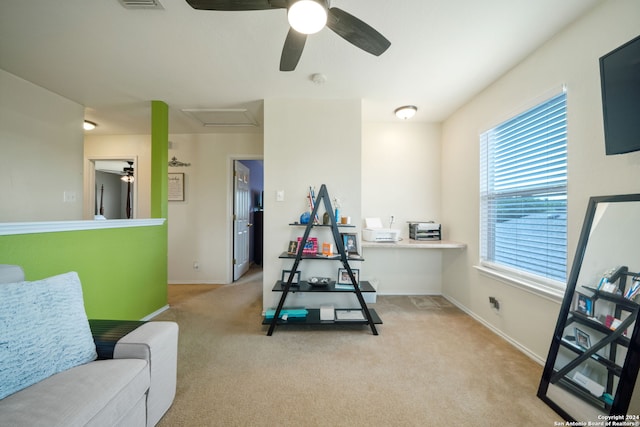 game room featuring ceiling fan and light colored carpet