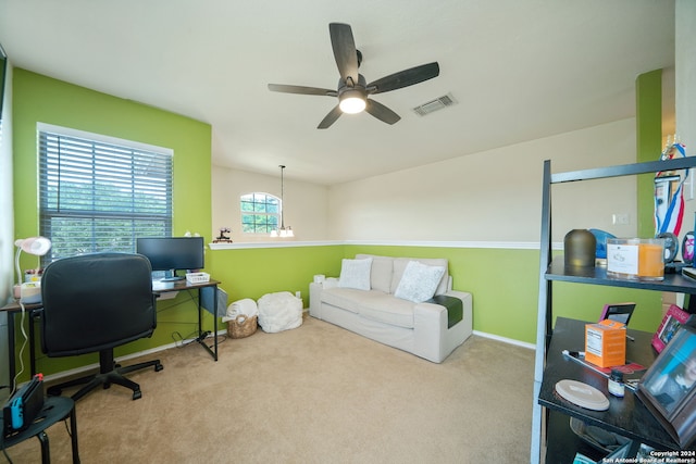 office area featuring a healthy amount of sunlight, carpet, and ceiling fan