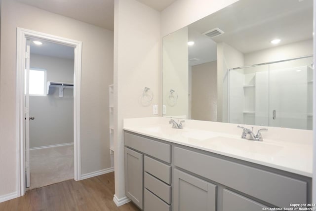 bathroom with tile flooring and large vanity