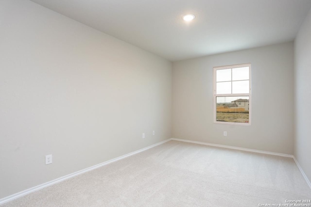 laundry area with electric dryer hookup, hardwood / wood-style floors, washer hookup, and gas dryer hookup