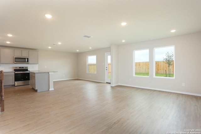 kitchen with sink, white cabinets, tasteful backsplash, and dark wood-type flooring