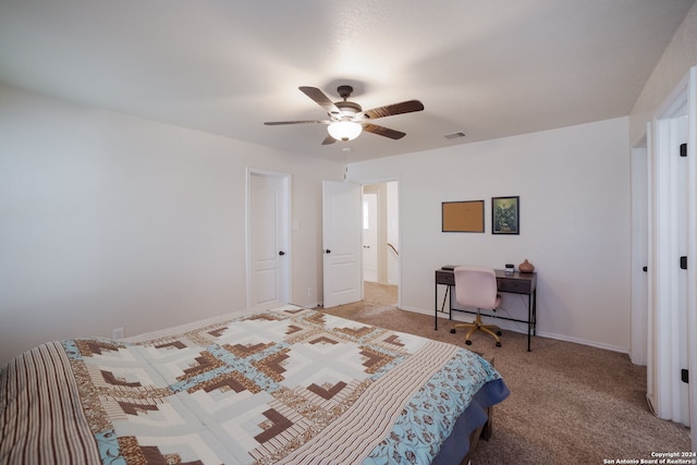 bedroom with ceiling fan and light carpet