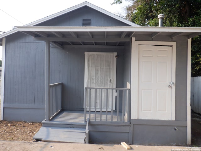 entrance to property with a porch