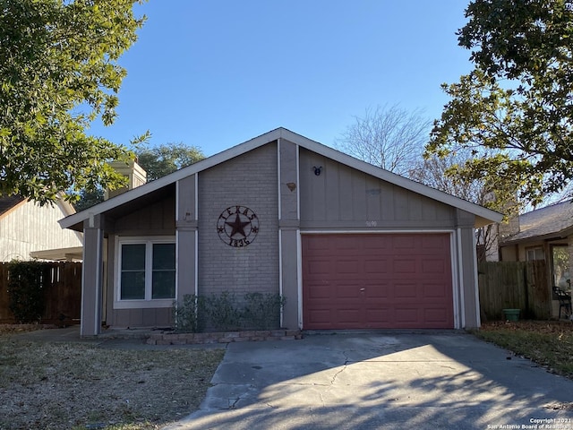 single story home with a garage