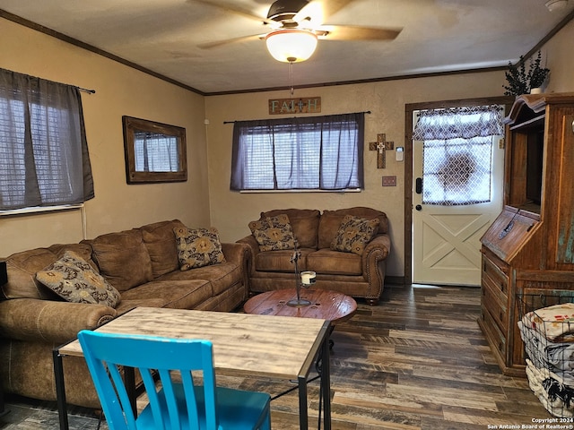 living room featuring dark hardwood / wood-style floors, ceiling fan, and crown molding