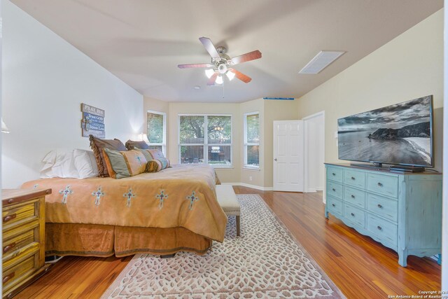 bedroom featuring light hardwood / wood-style flooring and ceiling fan