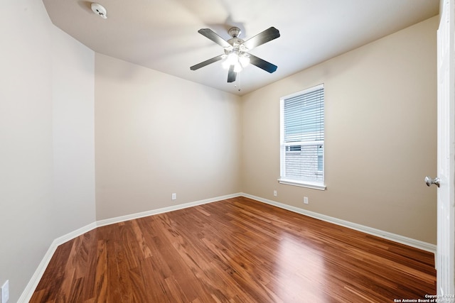 spare room with ceiling fan and hardwood / wood-style floors