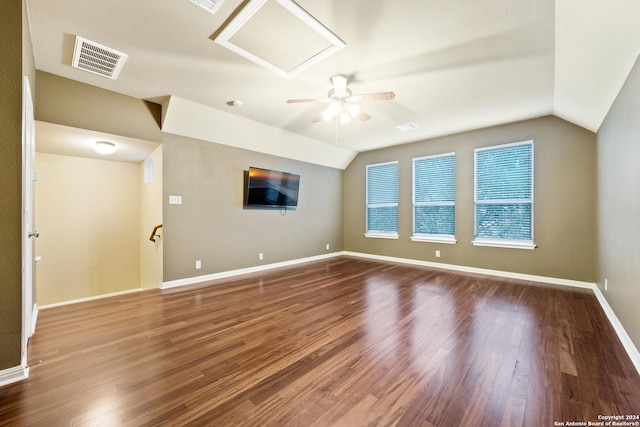 interior space featuring ceiling fan, wood-type flooring, and vaulted ceiling