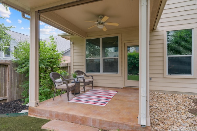 view of patio featuring ceiling fan