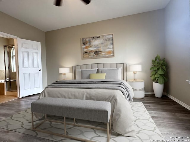 bedroom with ceiling fan and hardwood / wood-style floors