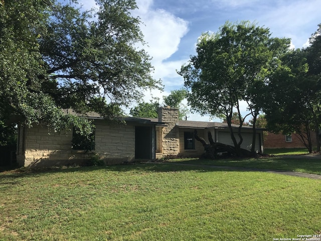 view of yard featuring a garage