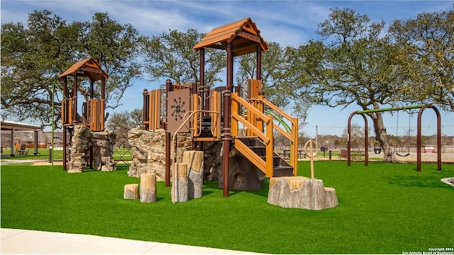 view of play area with a yard