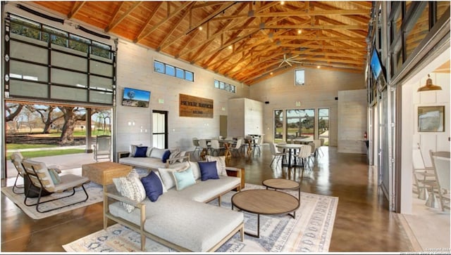 living room featuring wooden ceiling and high vaulted ceiling