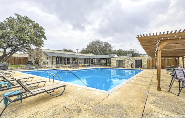 view of pool featuring a pergola and a patio