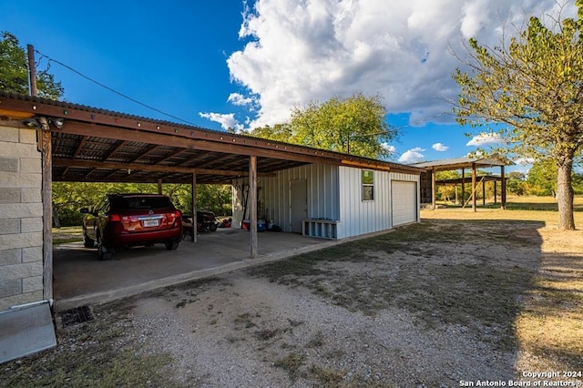 view of parking with a carport