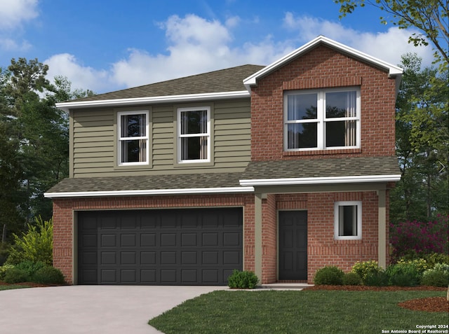 view of property with a garage and a front yard