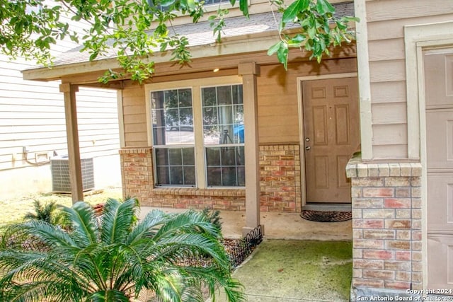 property entrance featuring cooling unit