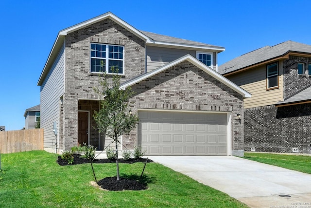 view of front of property with a garage and a front yard