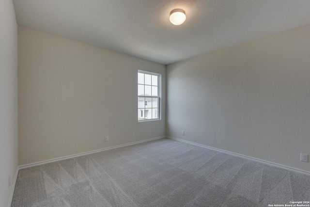 empty room with carpet floors