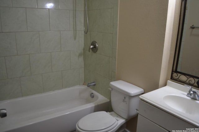 full bathroom featuring vanity, toilet, and tiled shower / bath combo