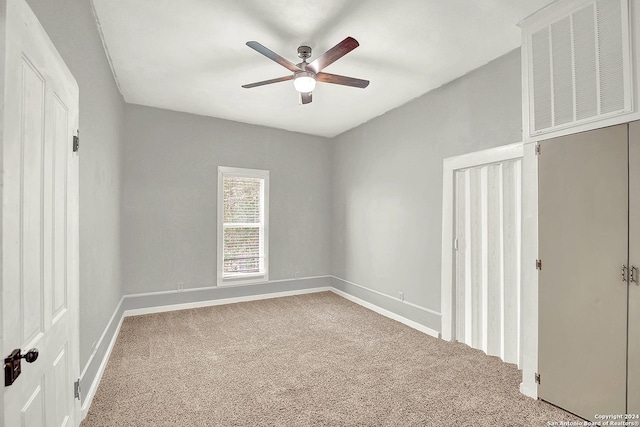 unfurnished bedroom with carpet and ceiling fan