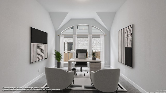 home office featuring carpet flooring and lofted ceiling