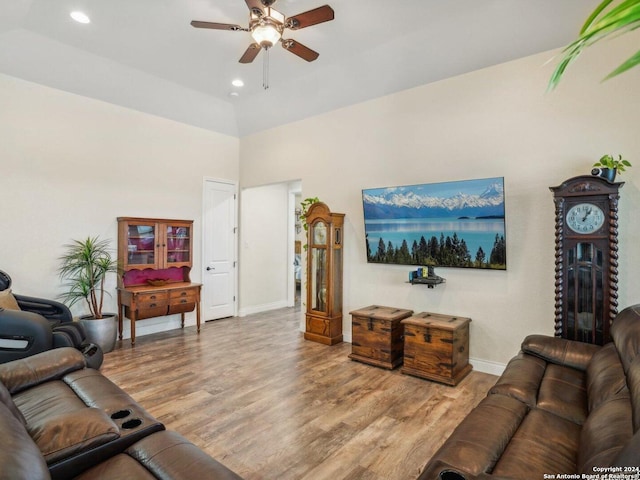 7803 US Highway 181, Falls City, TX 78113 - living area with ceiling fan, wood finished floors, baseboards, recessed lighting, and a towering ceiling