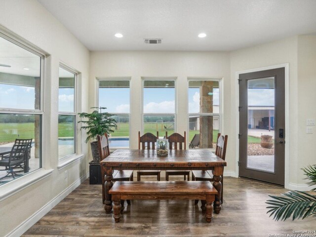 7803 US Highway 181, Falls City, TX 78113 - dining space with plenty of natural light, wood finished floors, baseboards, and recessed lighting