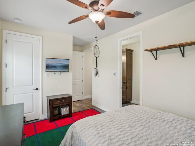 7803 US Highway 181, Falls City, TX 78113 - bedroom with ceiling fan and baseboards