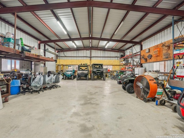 7803 US Highway 181, Falls City, TX 78113 - garage featuring metal wall and a workshop area